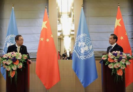 U.N. Secretary-General Ban Ki-moon (L) and China's Foreign Minister Wang Yi attend a joint news conference at Diaoyutai State Guesthouse, in Beijing, China, July 7, 2016. REUTERS/Jason Lee