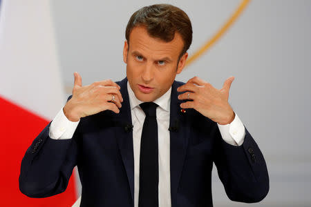 French President Emmanuel Macron speaks during a news conference to unveil his policy response to the yellow vests protest, at the Elysee Palace in Paris, France, April 25, 2019. REUTERS/Philippe Wojazer