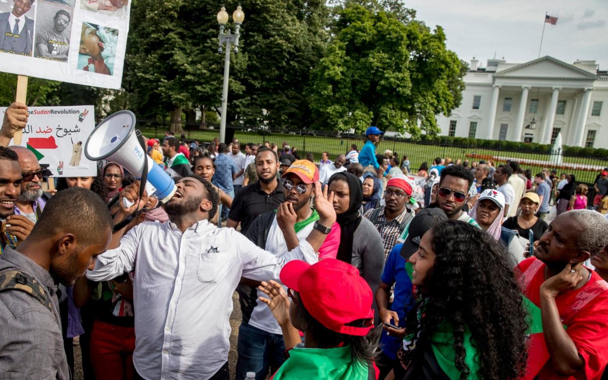 Protests broke out in Sudan in late December when an economic crisis emptied bank machines and forced the government to triple the price of bread - AP