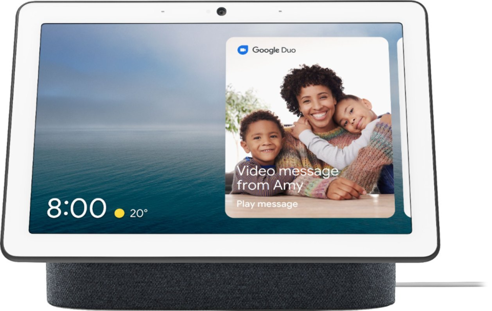 google nest hub with image of time and family photo