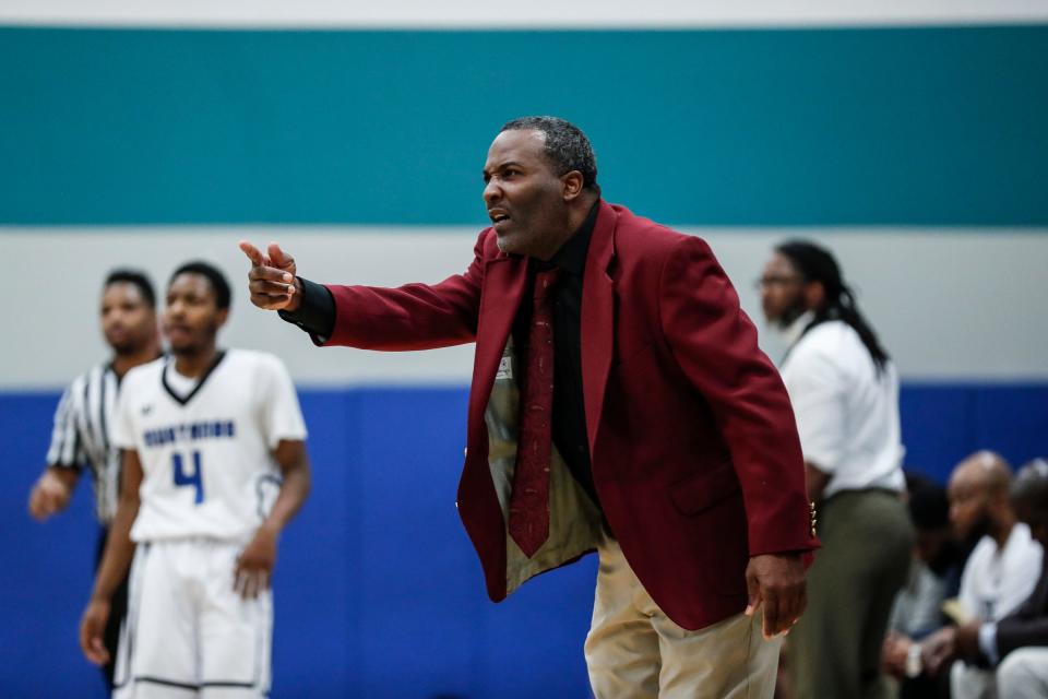 River Rouge head basketball coach LaMonta Stone talks to players during second half against Henry Ford Academy: School for Creative Studies at the A. Alfred Taubman Center For Design Education in Detroit, Tuesday, Jan. 8, 2019.