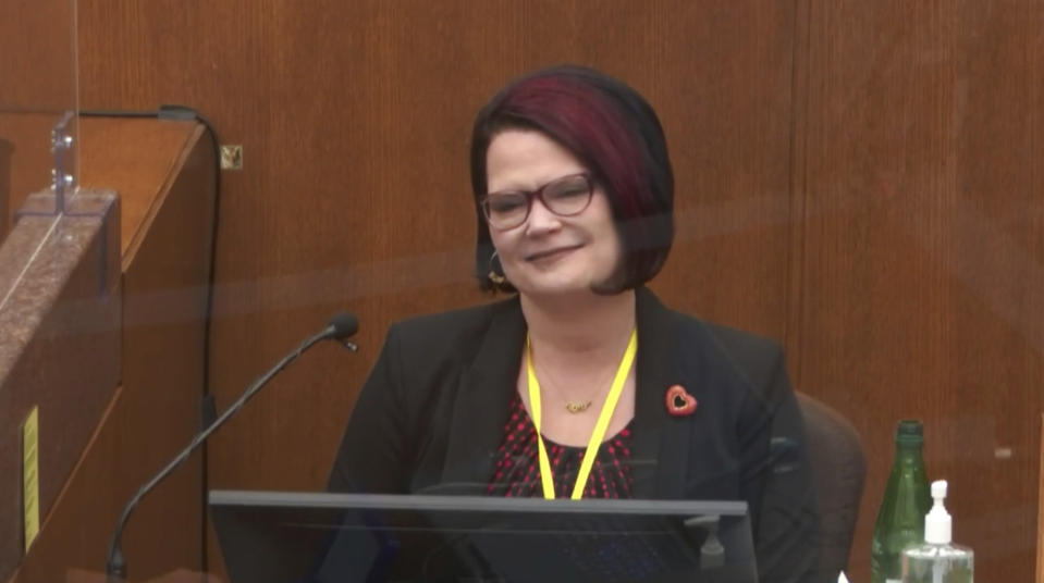 In this image from video, witness Courteney Ross answers questions as Hennepin County Judge Peter Cahill presides Thursday, April 1, 2021, in the trial of former Minneapolis police Officer Derek Chauvin at the Hennepin County Courthouse in Minneapolis, Minn. Chauvin is charged in the May 25, 2020 death of George Floyd. (Court TV via AP, Pool)