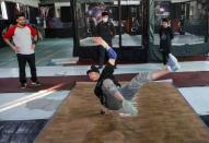 Afghan youth practise breakdancing during a training session in Kabul