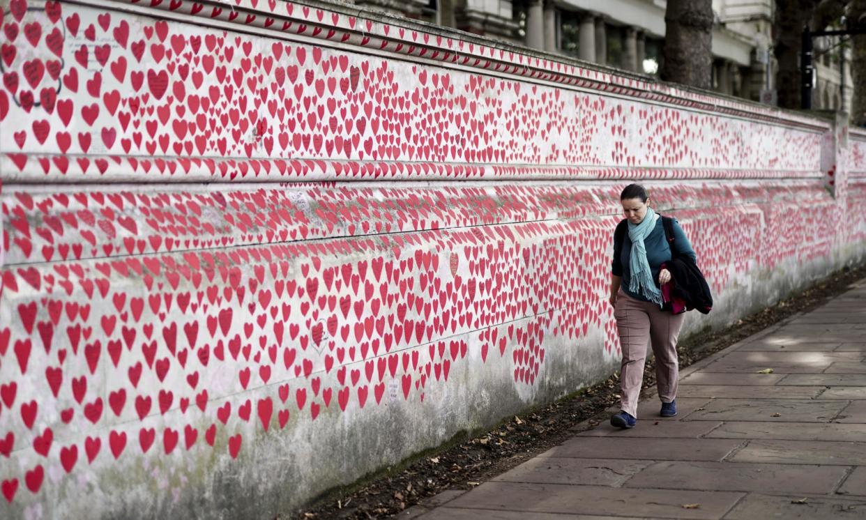 <span>Families, doctors and TUC representatives are expected to gather at the Covid memorial wall in London after the verdict.</span><span>Photograph: Jordan Pettitt/PA</span>