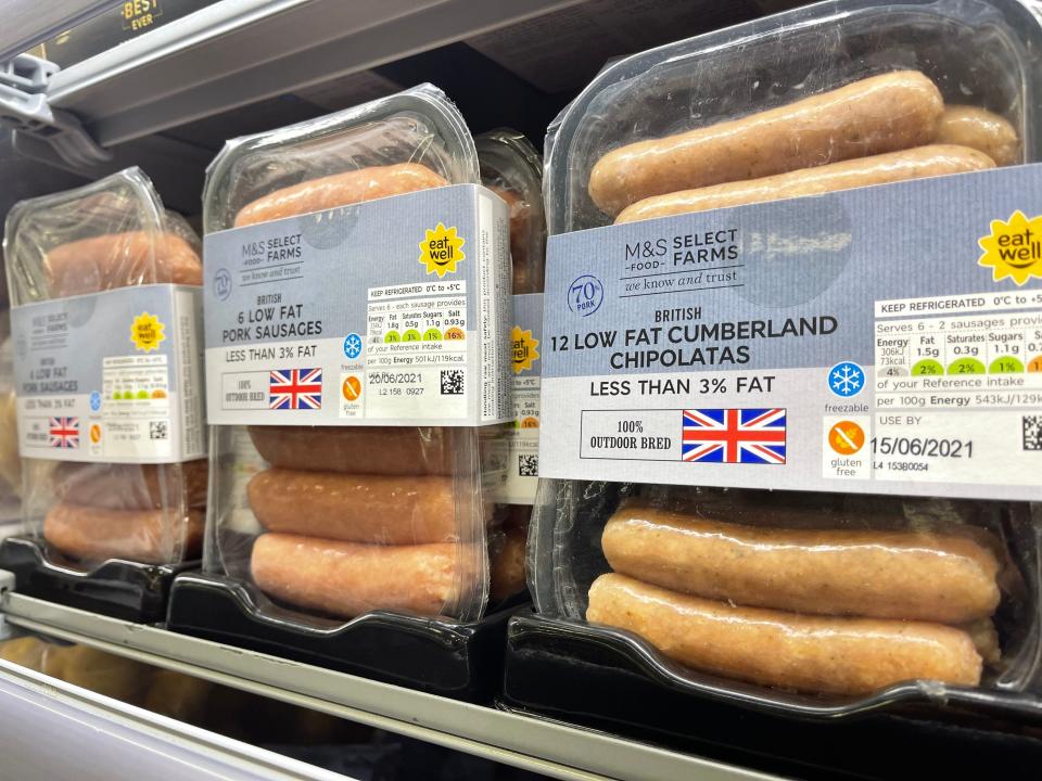 Packets of sausages in an M&S store in Belfast (PA)