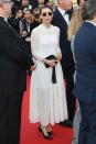 <p>Rooney chose a delicate white Dior dress for her final appearance at this year’s festival.<br><i>[Photo: Getty]</i> </p>