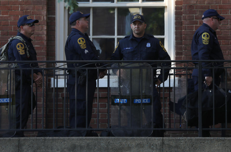 <p>Law enforcement arrives ahead of the one year anniversary of 2017 Charlottesville “Unite the Right” protests, in Charlottesville, Va., Aug. 10, 2018. (Photo: Jim Urquhart/Reuters) </p>