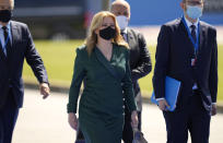 Slovakia's President Zuzana Caputova, center, arrives for a NATO summit at NATO headquarters in Brussels, Monday, June 14, 2021. U.S. President Joe Biden is taking part in his first NATO summit, where the 30-nation alliance hopes to reaffirm its unity and discuss increasingly tense relations with China and Russia, as the organization pulls its troops out after 18 years in Afghanistan.(AP Photo/Francisco Seco, Pool)