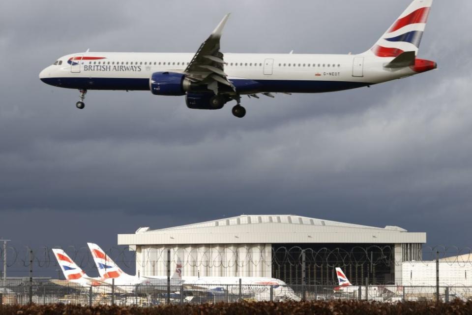 Britons have been urged to take less flights (AFP via Getty Images)