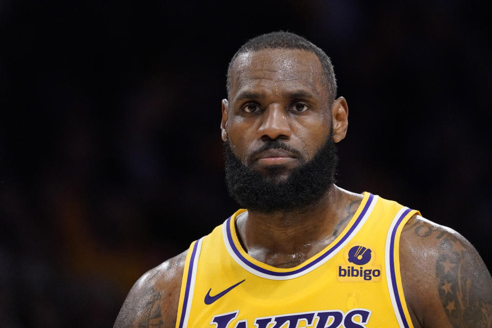 Los Angeles Lakers forward LeBron James stands on the court during the second half of an NBA basketball game against the Phoenix Suns Thursday, Oct. 26, 2023, in Los Angeles. (AP Photo/Mark J. Terrill)