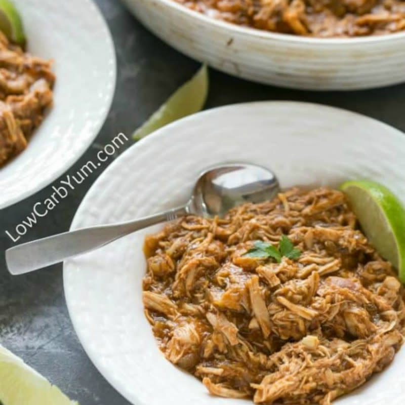 Salsa Verde Chicken made in the slow cooker or with an enameled Dutch oven, both giving flavorful shredded chicken in every bite.