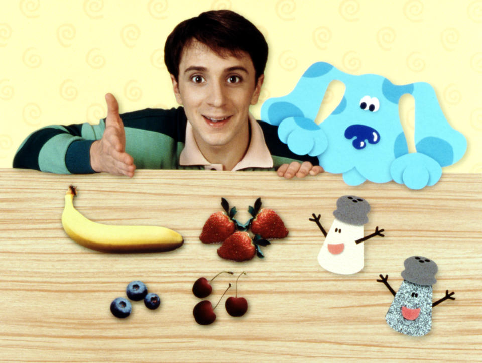 Steve and Blue show off a selection of healthy fruits