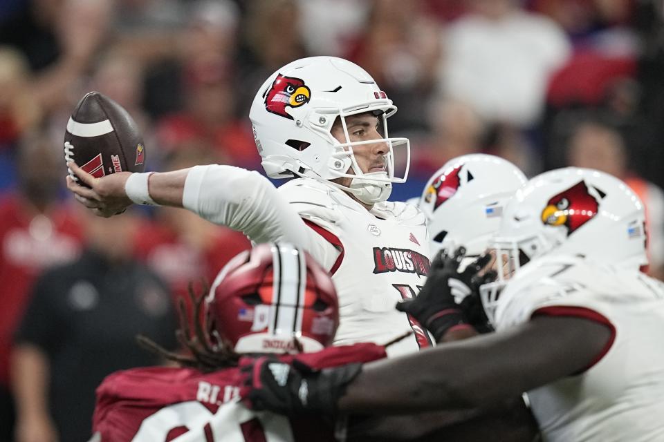 Louisville quarterback Jack Plummer throws a pass during the first half of an NCAA college football game against Indiana, Saturday, Sept. 16, 2023, in Indianapolis. (AP Photo/Darron Cummings)