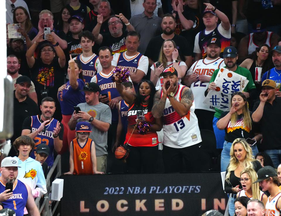 Suns fans react to a confrontation between Mavericks Marquese Chriss and Suns Bismack Biyombo during game 5 of the second round of the Western Conference Playoffs.