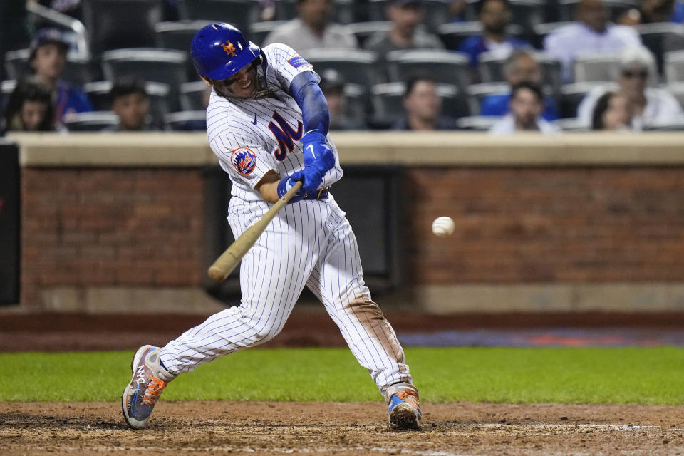 New York Mets' Francisco Alvarez hits a home run against the Arizona Diamondbacks during the eighth inning of a baseball game Tuesday, Sept. 12, 2023, in New York. (AP Photo/Frank Franklin II)