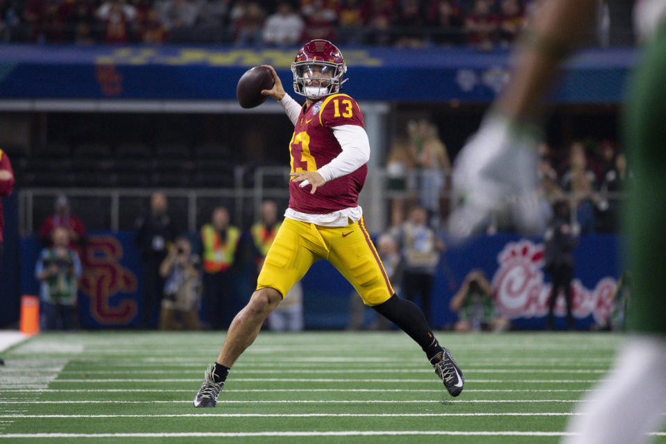 Jan 2, 2023; Arlington, Texas, USA; USC Trojans quarterback Caleb Williams (13) in action during the game between the USC Trojans and the Tulane Green Wave in the 2023 Cotton Bowl at AT&T Stadium. Mandatory Credit: Jerome Miron-USA TODAY Sports