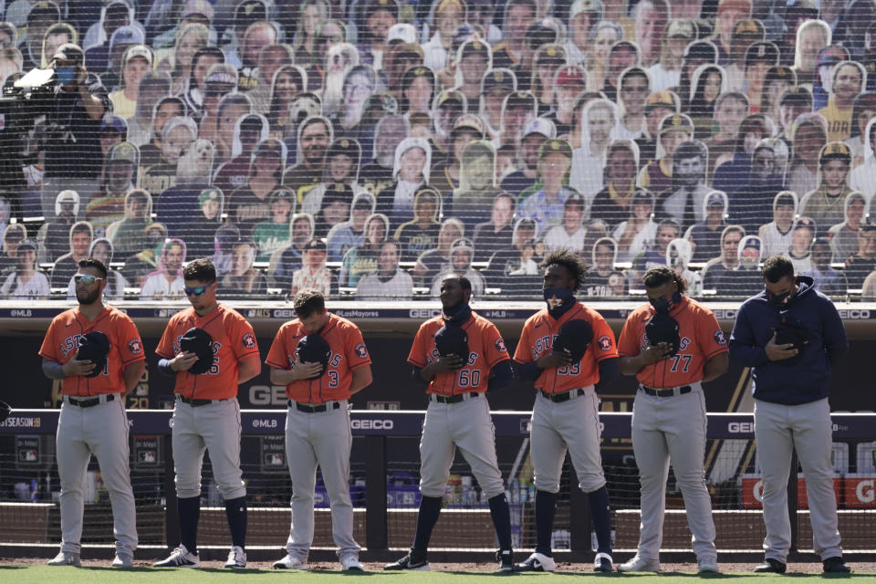 Houston Astros observe a moment of silence for Hall of Famer second baseman Joe Morgan before Game 2 of a baseball American League Championship Series against the Tampa Bay Rays, Monday, Oct. 12, 2020, in San Diego. Morgan passed away on Sunday, Oct. 11th. (AP Photo/Jae C. Hong)