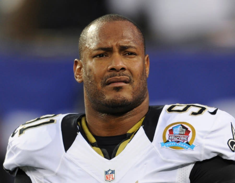 FILE – New Orleans Saints defensive end Will Smith appears before an NFL football game against the <a class="link " href="https://sports.yahoo.com/nfl/teams/ny-giants/" data-i13n="sec:content-canvas;subsec:anchor_text;elm:context_link" data-ylk="slk:New York Giants;sec:content-canvas;subsec:anchor_text;elm:context_link;itc:0">New York Giants</a>, Dec. 9, 2012, in East Rutherford, N.J. Cardell Hayes, the man who fatally shot the retired NFL star during a confrontation following a car crash in 2016, is scheduled for sentencing Thursday, April 25, 2024, in a New Orleans courtroom. (AP Photo/Bill Kostroun, File)