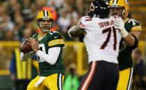 GREEN BAY, WI - SEPTEMBER 13: Quarterback Aaron Rodgers #12 of the Green Bay Packers looks to pass against the Chicago Bears in the first quarter at Lambeau Field on September 13, 2012 in Green Bay, Wisconsin. (Photo by Jonathan Daniel/Getty Images)