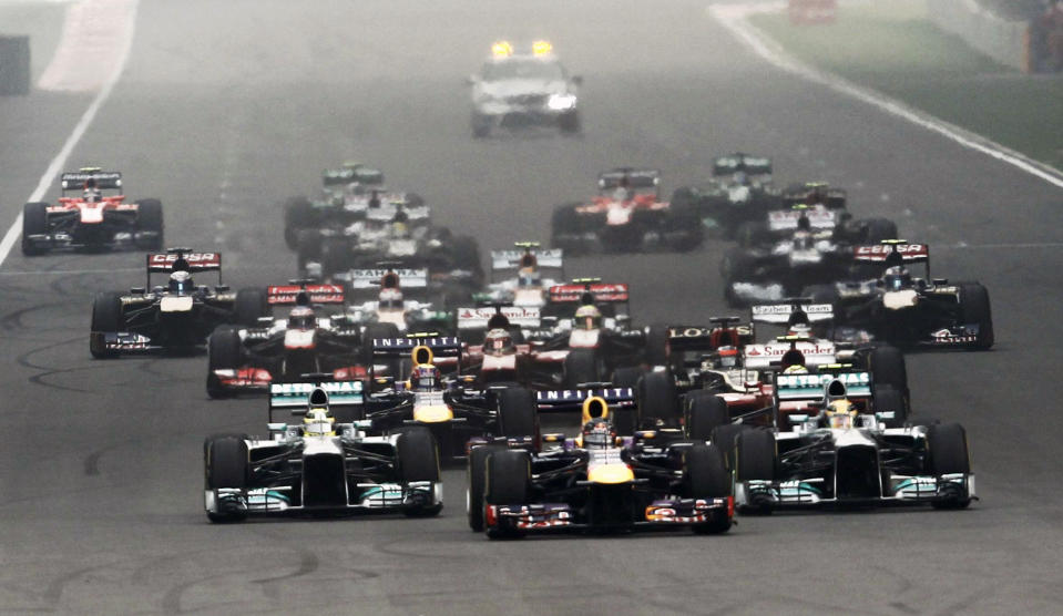 Red Bull Formula One driver Vettel leads the field at the start of the Indian F1 Grand Prix at the Buddh International Circuit in Greater Noida