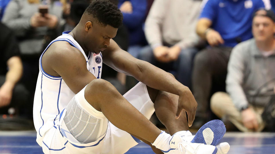 Duke freshman Zion Williamson suffered a knee injury less than a minute into Wednesday's game against North Carolina. (Photo: Sporting News)