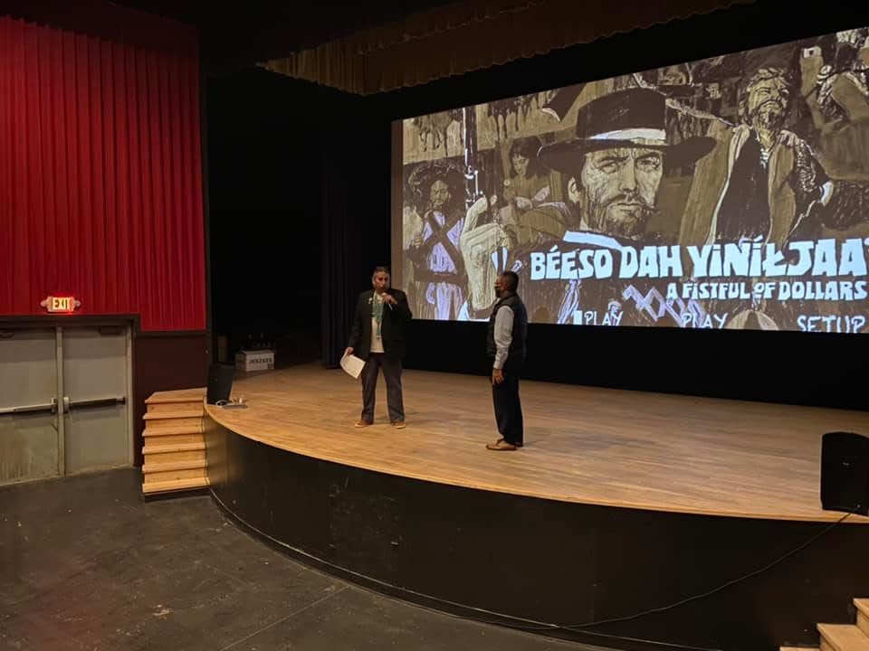 Navajo Nation Museum director Manuelito Wheeler, left, introduces "Béeso Dah Yiníljaa," the adaptation of "A Fistful of Dollars" in the Navajo language, during the Nov. 16 premiere in Window Rock, Arizona.