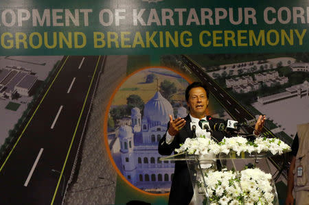 Pakistan's Prime Minister Imran Khan gestures as he speaks during the groundbreaking ceremony of the Kartarpur border corridor, which will officially open next year, in Pakistan November 28, 2018. REUTERS/Mohsin Raza