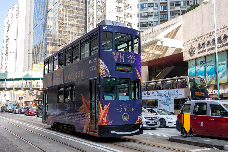 Hong Kong - October 16, 2021 : Double-decker tram at Fortress Hill, Hong Kong. Hong Kong has the world's largest operating fleet of double-decker trams.