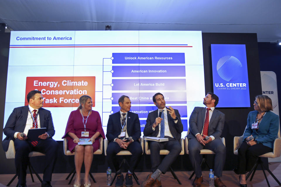 FILE - Rich Powell, co-chair of the Conservative Climate Foundation, left, moderates a panel discussion titled Conservative Solutions to Global Climate Challenges: A Robust U.S. Energy, Climate and Conservation Agenda, with from second left, Heather Reams, President of Citizens for Responsible Energy Solutions, Rep. John Curtis, of Utah, Rep. Garret Graves, R-La., Rep. Dan Crenshaw, R-Texas, and Rep. Mariannette Miller-Meeks, R-Iowa, in the U.S. Pavilion at the COP27 U.N. Climate Summit, in Sharm el-Sheikh, Egypt, Nov. 11, 2022. House Republicans are searching for solutions to climate change without restricting American-produced energy that comes from burning oil, coal and gas. (AP Photo/Thomas Hartwell, File)