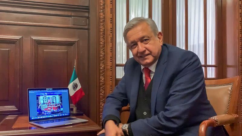 Mexico's President Andres Manuel Lopez Obrador celebrates the U.S. House approval of the USMCA North American trade deal at the National Palace in Mexico City