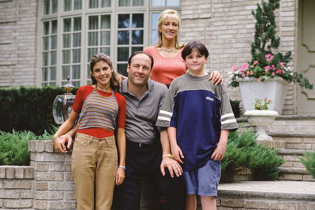 <p>Courtesy of HBO</p> Jamie-Lynn Sigler, James Gandolfini, Edie Falco and Robert Iler in 'The Sopranos' in 1999.