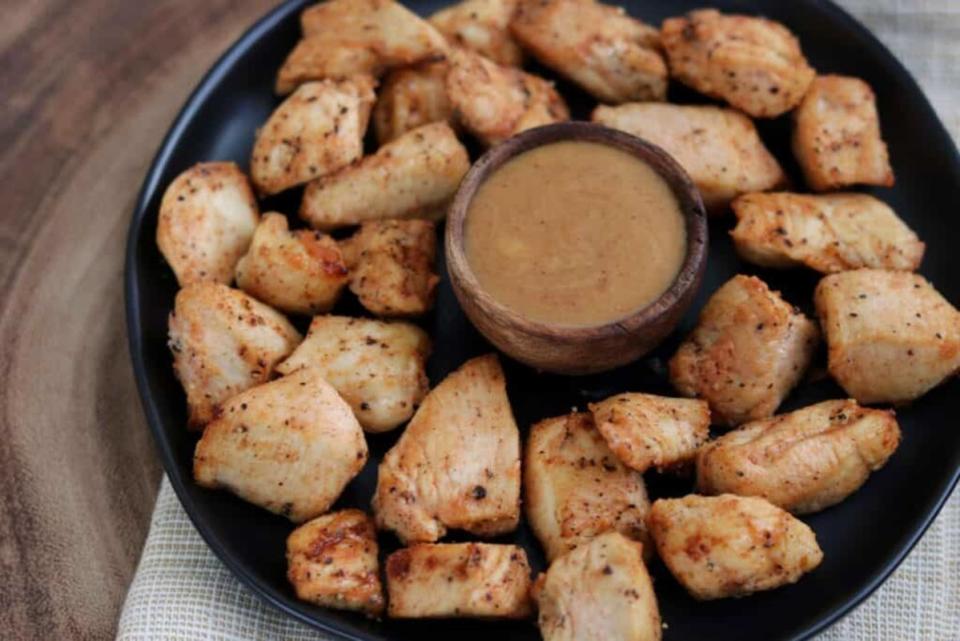 <p>Masonfit</p><p>Now you can make Chick-fil-A’s grilled chicken nuggets at home in an air fryer! </p><p><strong>Get the recipe: </strong><a href="https://masonfit.com/copycat-air-fryer-chick-fil-a-grilled-nuggets/" rel="nofollow noopener" target="_blank" data-ylk="slk:Copycat Air Fryer Chick-fil-A’s Grilled Chicken Nuggets;elm:context_link;itc:0;sec:content-canvas" class="link "><strong>Copycat Air Fryer Chick-fil-A’s Grilled Chicken Nuggets</strong></a></p>