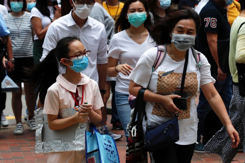 A student wears surgical mask to prevent the spread of the coronavirus disease (COVID-19), in Hong Kong