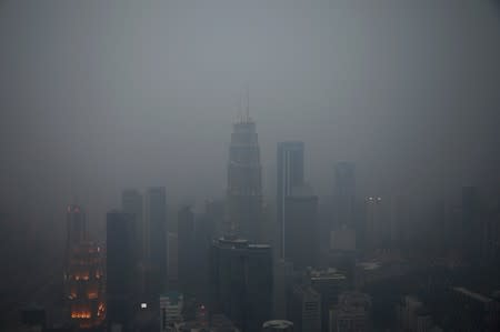 A view of the city skyline shrouded by haze in Kuala Lumpur