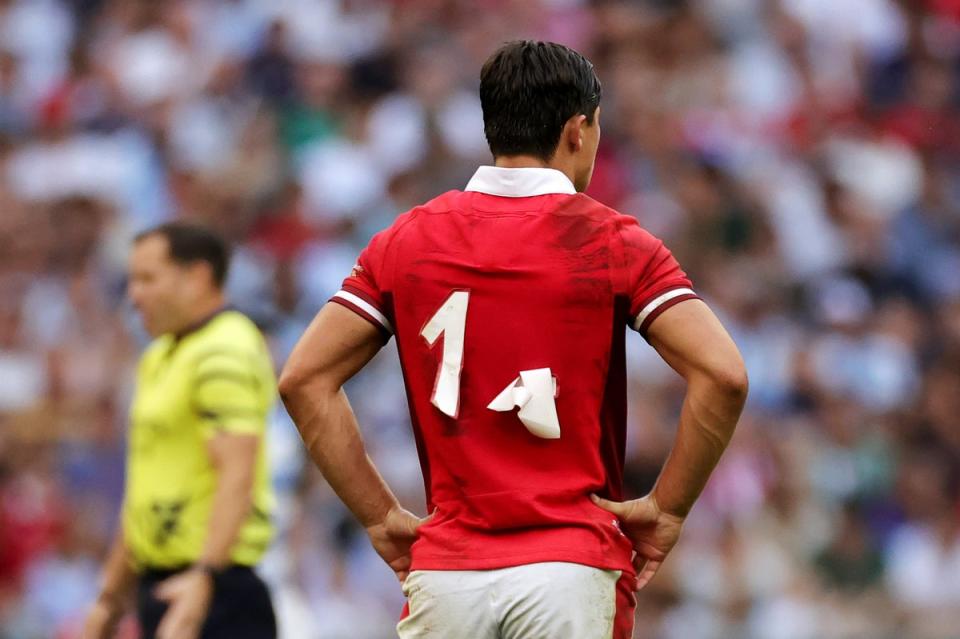 The numbers of the Welsh players peeled off the back of their shirts in a bizarre first quarter (Getty)