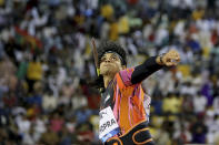 Neeraj Chopra, of India, makes an attempt in the men's javelin throw during the Diamond League athletics meet at the Qatar Sports Club stadium in Doha, Friday, May 10, 2024. (AP Photo/Hussein Sayed)