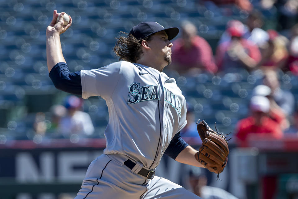 Seattle Mariners starting pitcher Logan Gilbert throws to a Los Angeles Angels batter during the first inning of a baseball game in Anaheim, Calif., Monday, Sept. 19, 2022. (AP Photo/Alex Gallardo)