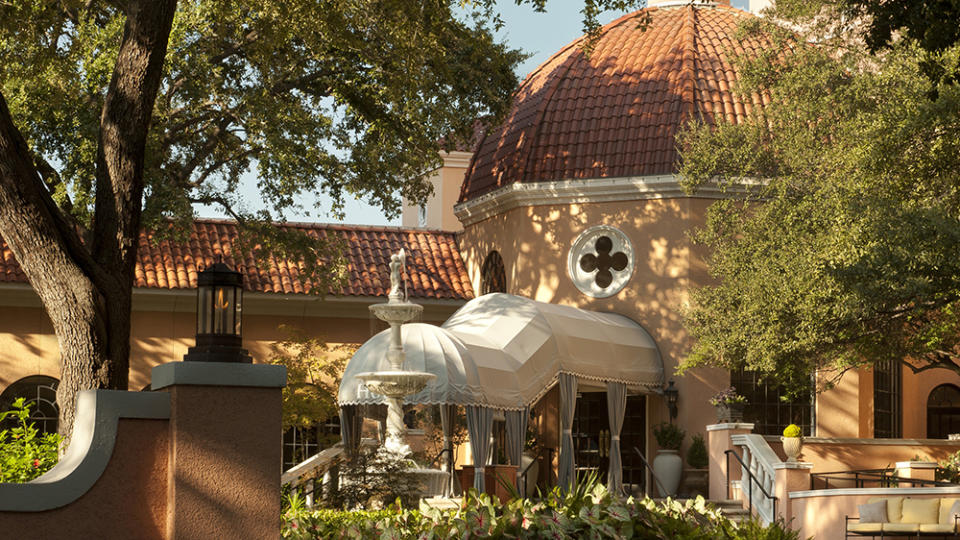 The sunny entrance view of the massive Rosewood Mansion. - Credit: Rosewood Mansion on Turtle Creek