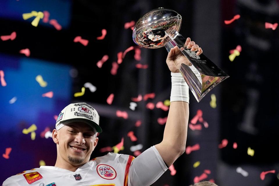 Coach Andy Reid has paid tribute to his quarterback Patrick Mahomes for pushing through the pain of an injury to lead the Kansas City Chiefs to their second Super Bowl victory in four years (Brynn Anderson/AP) (AP)