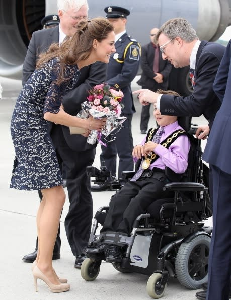 Royals shake hands after landing