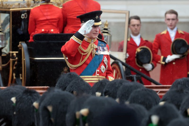King Charles III takes a salute in front of his armed forces at the annual Trooping the Colour on The Mall in London on Saturday. Photo by Hugo Philpott/UPI