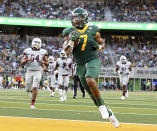 Baylor running back Abram Smith (7) scores a touchdown against Texas Southern in the first half of an NCAA college football game, Saturday, Sept. 11, 2021, in Waco, Texas. (Jerry Larson/Waco Tribune-Herald via AP)