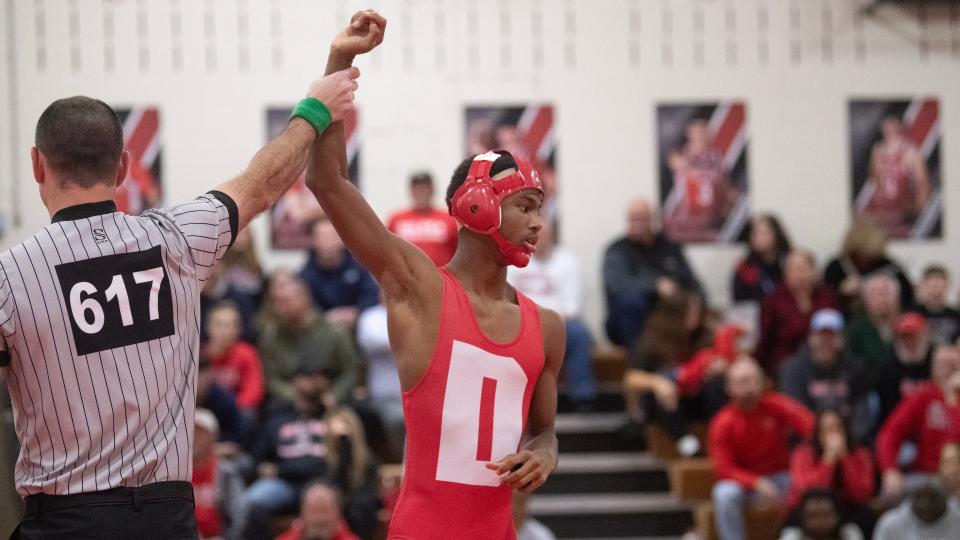 Delsea's Amari Vann has his arm raised after pinning Wayne Valley's Devon Bolton during the 113 lb. bout of the state Group 3 wrestling semifinal held at Delsea Regional High School on Friday, February 9, 2024.