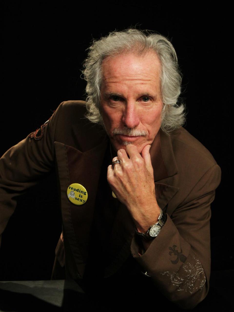 This April 17, 2013 photo shows fFormer Doors drummer John Densmore in New York. The 68-year drummer is no stranger to chronicling his former band. He wrote The New York Times best-seller, “Riders on the Storm” in 1991. He keeps the spirit of Jim Morrison alive in his latest book, "The Doors Unhinged: Jim Morrison's Legacy Goes on Trial." (AP Photo/John Carucci)