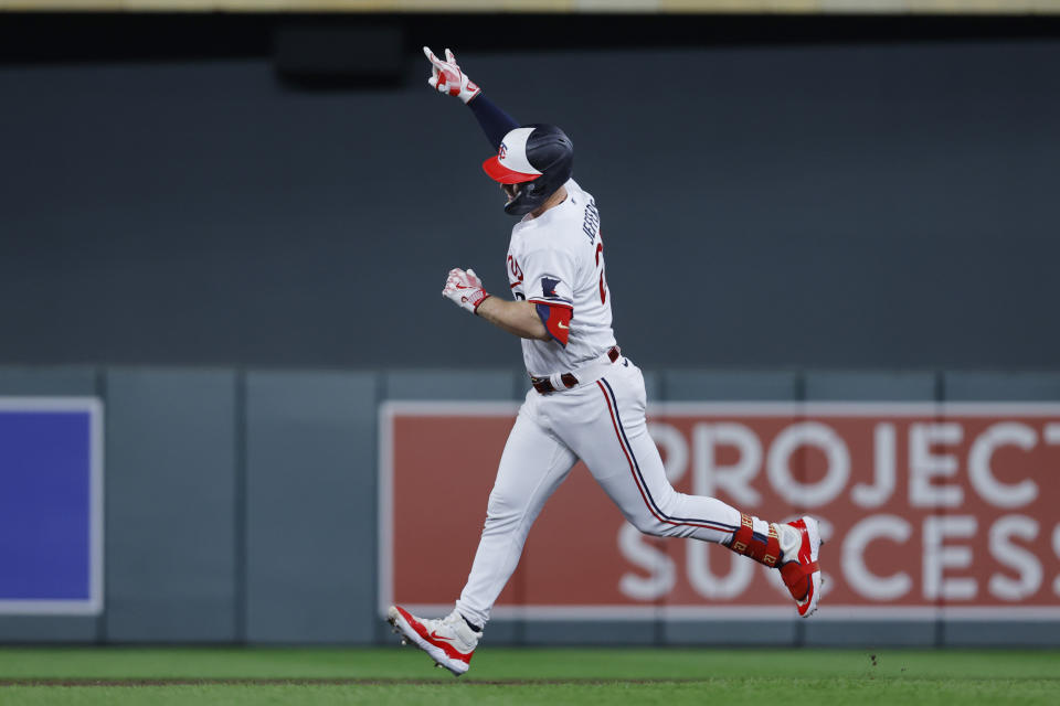 Minnesota Twins' Ryan Jeffers runs the bases on his two-run home run against the Texas Rangers in the eighth inning of a baseball game Thursday, Aug. 24, 2023, in Minneapolis. (AP Photo/Bruce Kluckhohn)