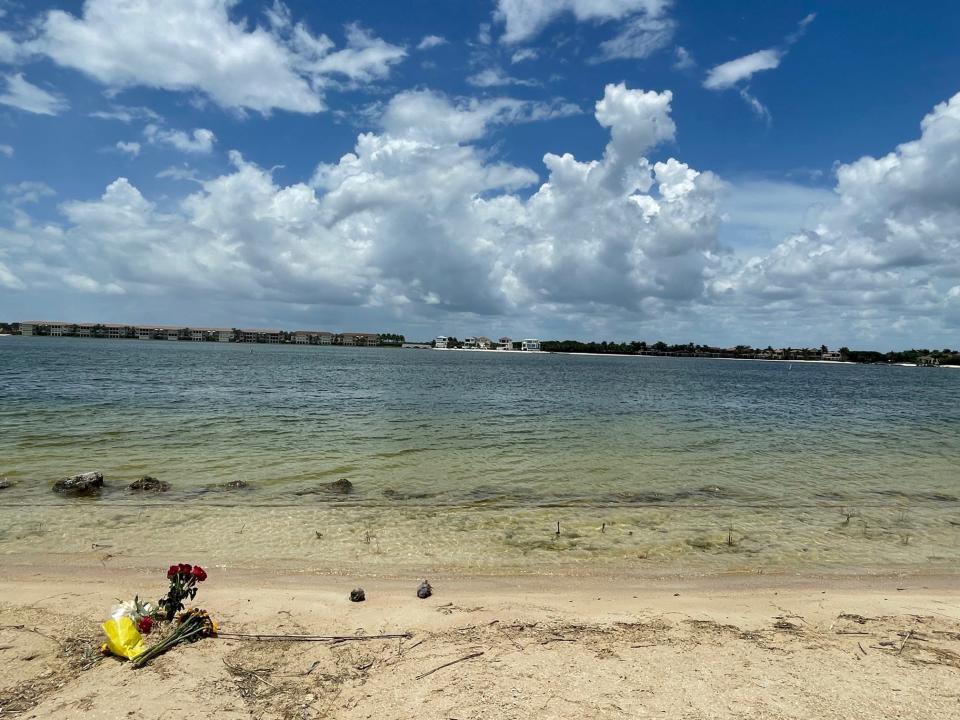 A  small memorial has been placed on a beach at FGCU where two children 12 and under drowned Monday. A university statement said the beach is not intended for public use and there are no swimming signs alerting to a sharp drop-off by the water's edge.