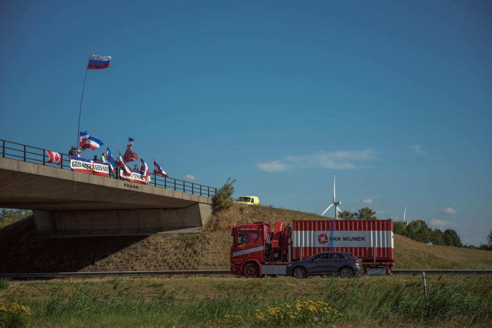 Protesters gather over the A1 motorway in support of local farmers as the Dutch government plans measures to reduce nitrogen emissions.  (Alexey Yurenev for NBC News)