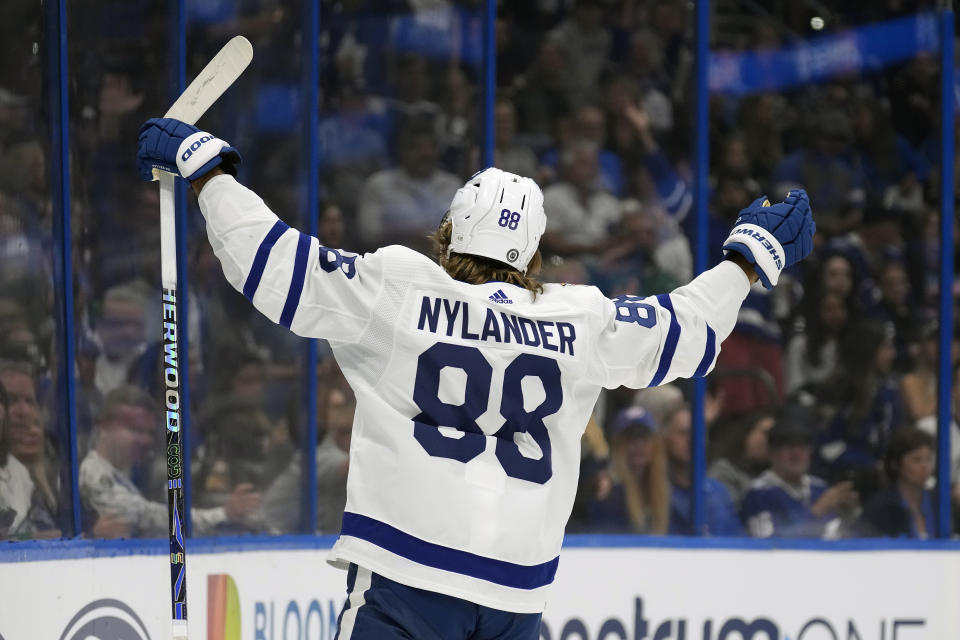 Toronto Maple Leafs right wing William Nylander (88) celebrates his goal against the Tampa Bay Lightning during the first period of an NHL hockey game Saturday, Oct. 21, 2023, in Tampa, Fla. (AP Photo/Chris O'Meara)