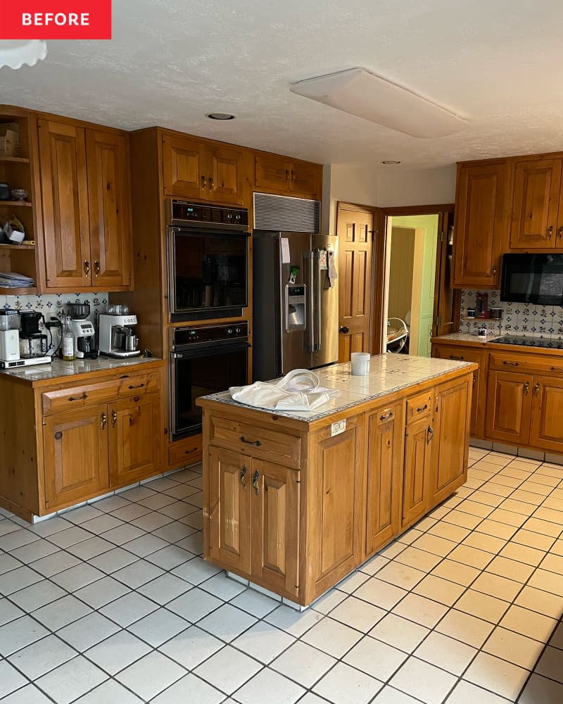 Wooden cabinets in kitchen before renovvation.