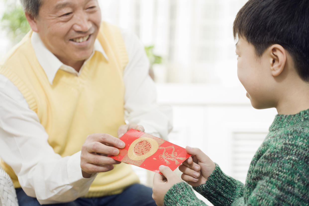 Red packets, or hong baos, are given out during the Chinese New Year. (PHOTO: Getty Images)